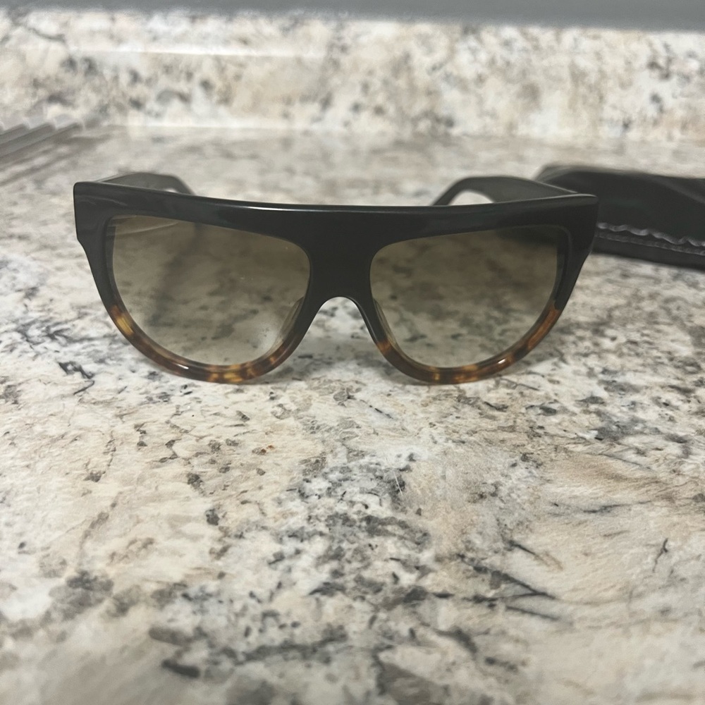 Worn flat top Celine sunglasses